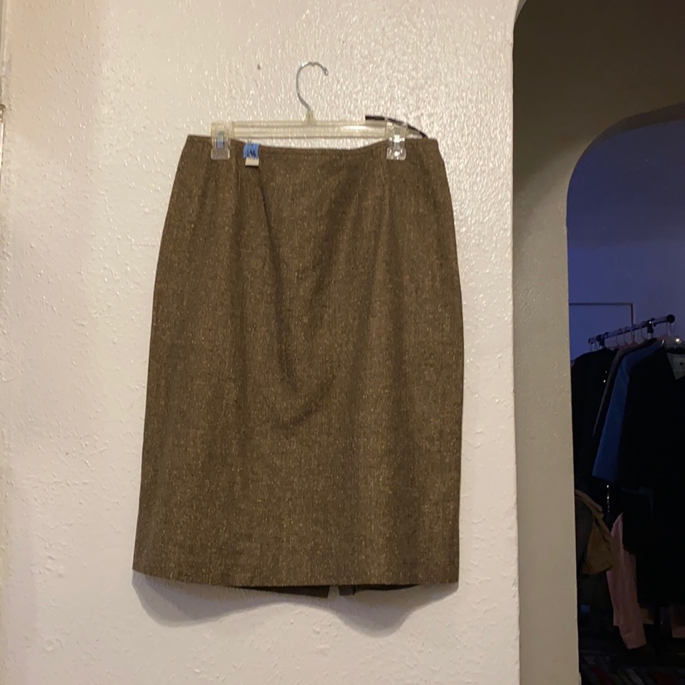 Brown skirt suit.